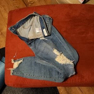 Distressed light denim skinny jeans